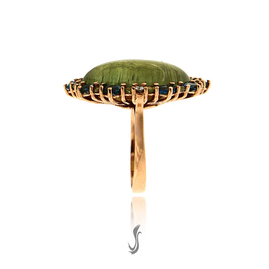 anello con tormalina, diamanti, topazi london, peridoti e oro