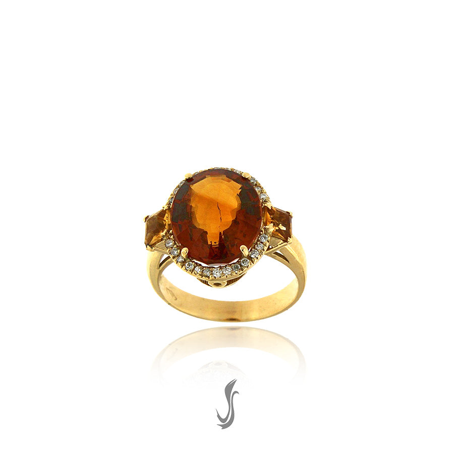 anello in oro, diamanti e topazio