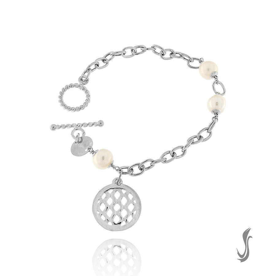 Silver bracelet with Pearls. With small pendant